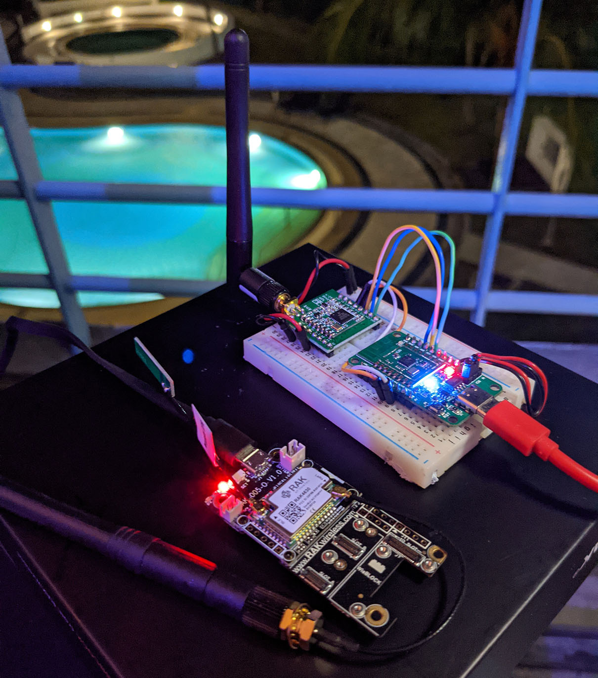 PineCone BL602 RISC-V Board with Hope RF96 LoRa Transceiver (top) receives LoRa packets from RAKwireless WisBlock (bottom)