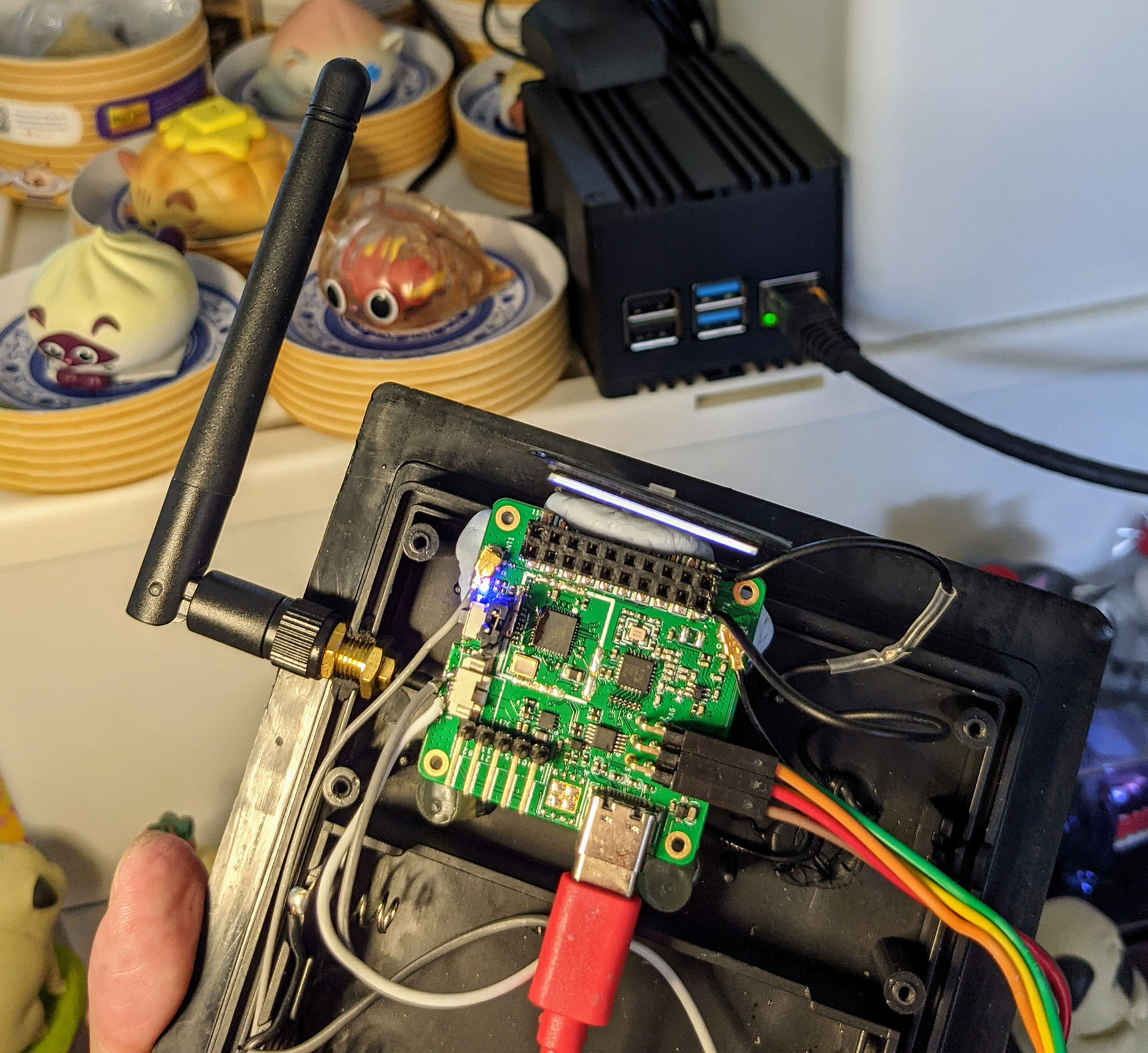 PineDio Stack BL604 RISC-V Board (foreground) talking to The Things Network via RAKWireless RAK7248 LoRaWAN Gateway (background)